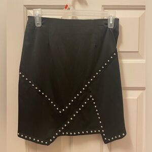 Black skirt, with zip up back. Size small. Rarely used, if ever.